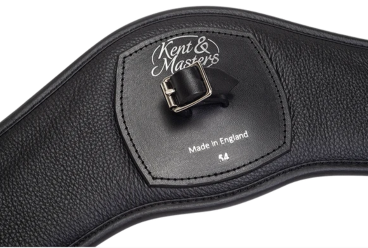 Close up of the black horse girth with the Kent & Masters logo printed.